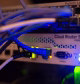 A family streaming 4K video and working on laptops using unlimited high-speed home internet in Canada.