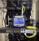 Modern optical fibre internet modem delivering high speed wireless internet to a home office in Canada.