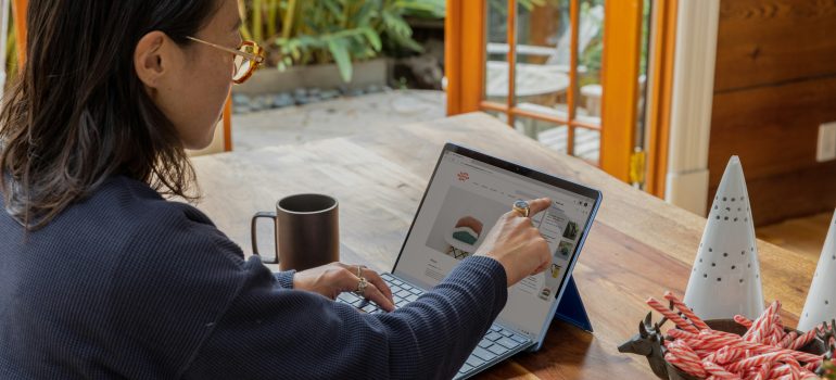 Business owner reviewing a commercial internet contract during Black Friday promotional period