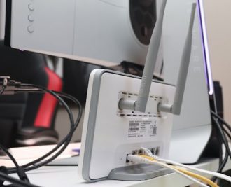 Commercial fibre internet router installation in a Canadian multi-tenant student residence building.