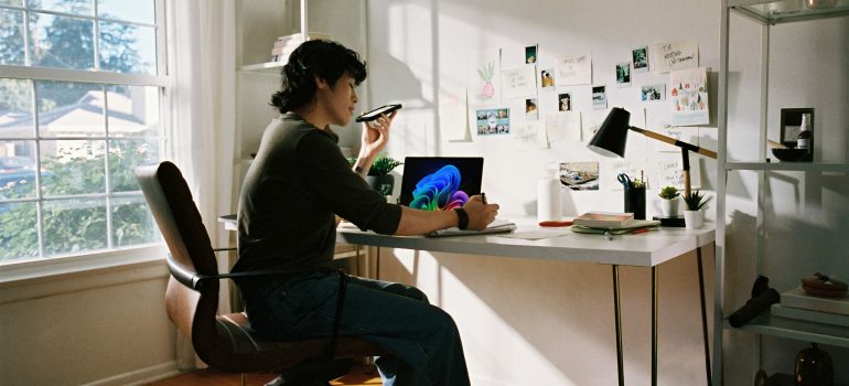 Person reading an internet agreement at a table